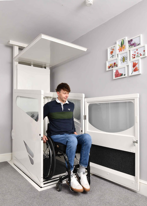 through floor wheelchair lift a man using a through floor wheelchair lift